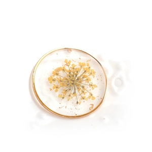 Golden round pressed flower pendant with yellow dried flower and gold foil in resin