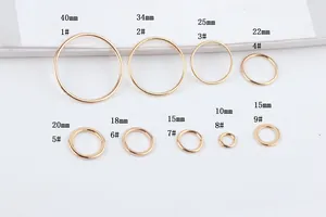 Size chart showing 10mm to 40mm golden alloy circular rings for DIY jewelry earring parts