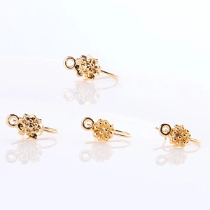 Detail of gold-plated flower-shaped U-shaped earring hooks for DIY jewelry making