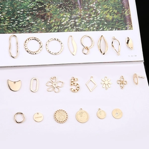 Golden irregular metal charms for jewelry DIY including clover and coin pendants