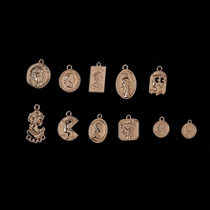 Set of 11 vintage alloy portrait coin pendants for DIY jewelry making in rose gold finish