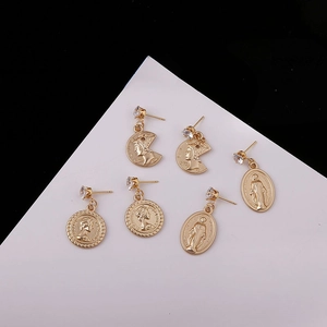 Vintage gold coin pendants with embossed portraits and sparkling rhinestone studs set