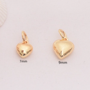 Polished 14K gold filled solid heart charms in 7mm and 9mm sizes for DIY jewelry making