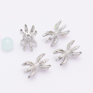 4-piece set of silver 14K gold plated 6-prong star charms with white micro-pave zircons