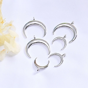 Polished silver crescent moon pendants in various sizes for DIY jewelry making