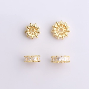 Detail view of 14K gold plated spacer beads with micro-set cubic zirconia for DIY jewelry