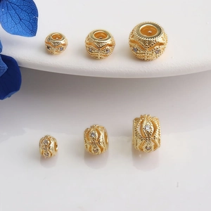 Macro shot of 14K gold filled spacer beads with micro-pave cubic zirconia for DIY jewelry
