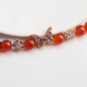 14K gold-plated butterfly and flower charms with red agate beads for DIY jewelry