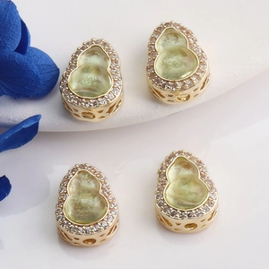 14K gold filled gourd pendant with sparkling zircons and translucent gemstone inlay