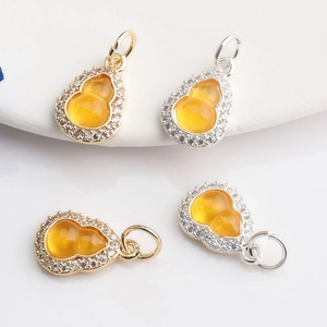 14K gold plated gourd pendant with yellow crystal and sparkling zircon pavé detail