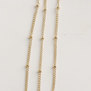 Minimalist 14K gold filled chain with decorative metal knots and a polished finish