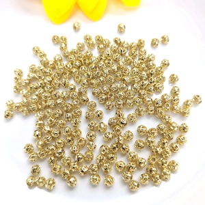Polished 14k gold-filled hollow beads with diamond-cut texture for DIY jewelry making