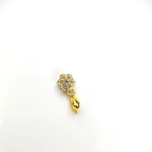 Close-up of 18k gold flower pendant clasp with sparkling zircon inlay for DIY necklace