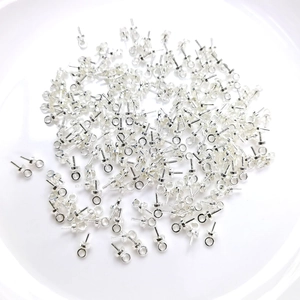 Macro view of 3mm gold filled eye pins for DIY pearl jewelry making projects