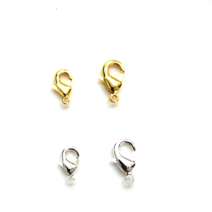Detail of 14k gold-filled lobster clasps in gold and silver finishes and various sizes