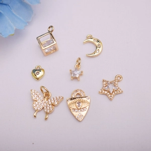 14K gold plated micro-pave zircon charms featuring stars, moons and butterflies
