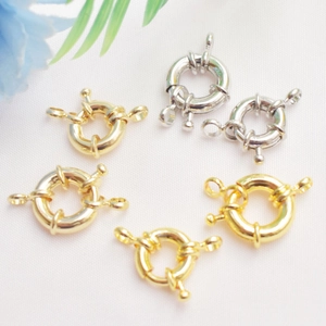 Detalle de cierres de resorte redondos bañado en oro y plata 14K para joyería artesanal