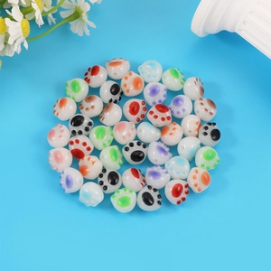 Detailed view of colorful acrylic cat paw beads for handmade jewelry DIY bracelets