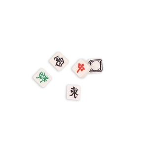 Macro detail of Mahjong beads featuring engraved characters for DIY jewelry making