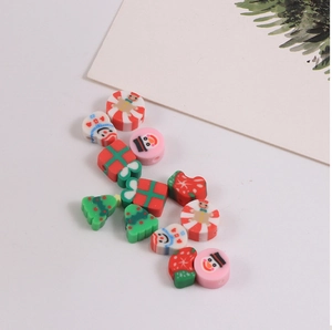 Detailed macro shot of assorted Christmas polymer clay beads for DIY jewelry making