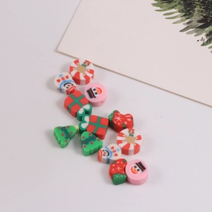 Christmas themed polymer clay beads for DIY jewelry making featuring snowman and tree shapes