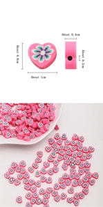 Macro view showing 1cm pink heart polymer clay beads with floral patterns for DIY jewelry
