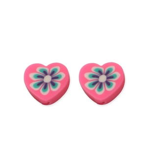 Pink heart-shaped polymer clay beads with colorful flower patterns for DIY jewelry