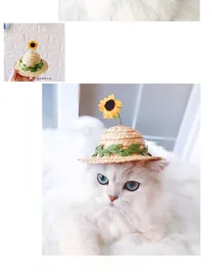 Detail of mini sunflower straw hat for cats with woven texture and green leaf accents