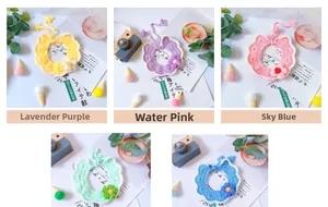 Detailed view of hand-knitted pet collars with puff flowers in five pastel colors
