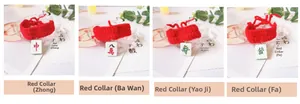 Detail of red knitted pet collars with mahjong tiles including Red Dragon and Green Dragon