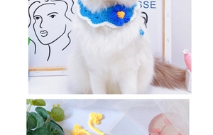 Detail of handmade crochet pet collar featuring 3D knitted flowers for cats and small dogs