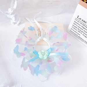 Detail of pet lace collar with 3D butterflies, satin bow, and pearl crochet flower