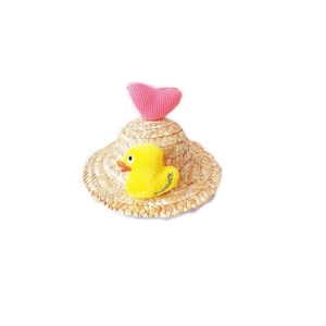 Woven straw pet sun hat with pink heart and yellow plush duckling decor on white background