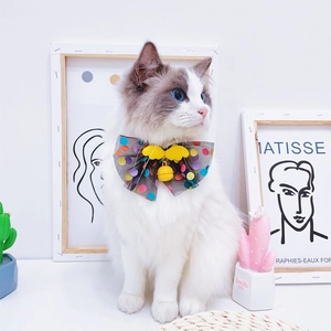 Pet bow tie collar with black mesh, colorful dots, yellow wings and a gold bell