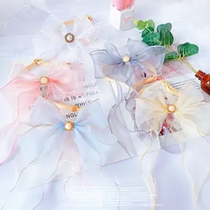 Detailed set of lace pet collars with organza bows and pearls in five soft colors