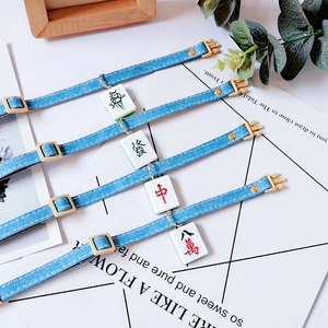 Denim dog collar set with mahjong pendants including Fa and Zhong charms in blue style