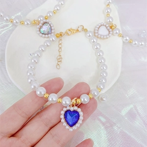 Adjustable pearl pet necklace with heart-shaped blue sapphire pendant for cats and dogs