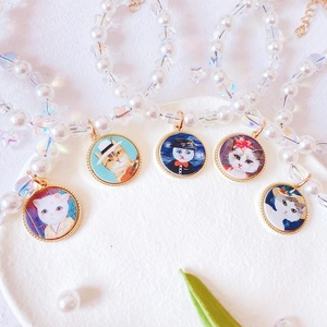 Artistic cat illustration pearl necklaces with gold pendants and colorful star beads