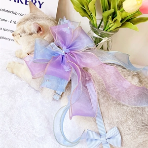 Blue plaid pet harness with large purple organza bow for cats and small dogs