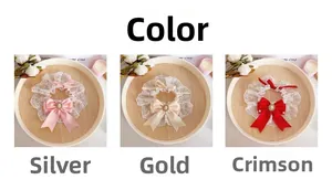 Detailed view of elegant lace pet collars with satin bows and pearl rhinestones