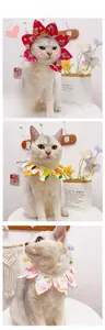 Detailed view of petal-shaped pet collars with floral, lemon, and cat prints