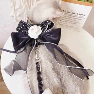 Adjustable dog harness with black camellia flower and bow tie in tweed style