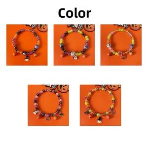 Detailed set of colorful Halloween pet beaded necklaces with pumpkin and ghost charms