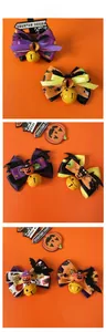 Detail view of Halloween pet bow ties with bats, pumpkins and small yellow bells