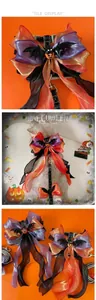 Detail von Halloween-Haustiergeschirr mit Netzschleife, Fledermaus- und Kürbisdekor