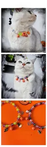 Detail of Halloween pet collar with colorful beads, festive charms, and a small orange bell