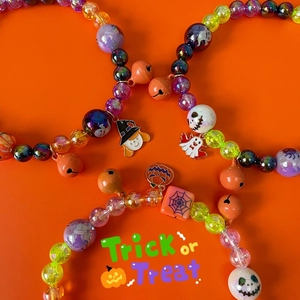Halloween colorful beaded necklaces with pumpkin, witch, and ghost charms for pets and parties