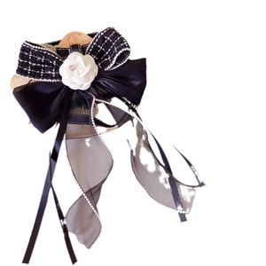Adjustable black and white camellia dog harness with bowknot and elegant lace ribbons