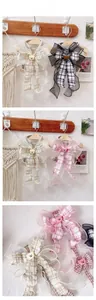 Detail of bear buckle and plaid organza bow on Korean style adjustable pet harness