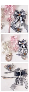 Detail of plaid pet harness set featuring organza bow and 3D bear ornaments